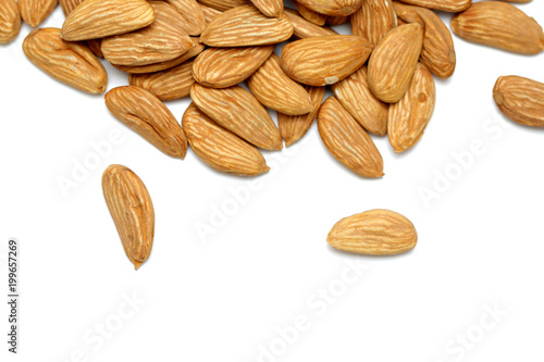 Almond mamra giri isolated. Group of almond nuts isolated on white background. Full depth of field photo