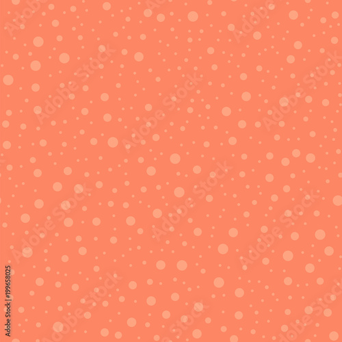 Light polka dots seamless pattern on coral background. Symmetrical classic light polka dots textile pattern in restrained colours. Seamless scattered confetti fall chaotic decor. Vector illustration.