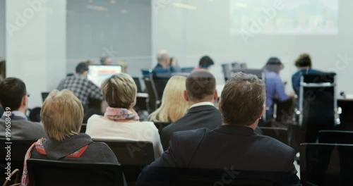 Wallpaper Mural Business presentation seminar event. Listening to the speech about marketing and management of company for successful sales. Talk about politics and finance. Torontodigital.ca