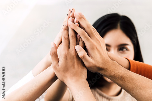 Successful hand of business team giving a high fives gesture