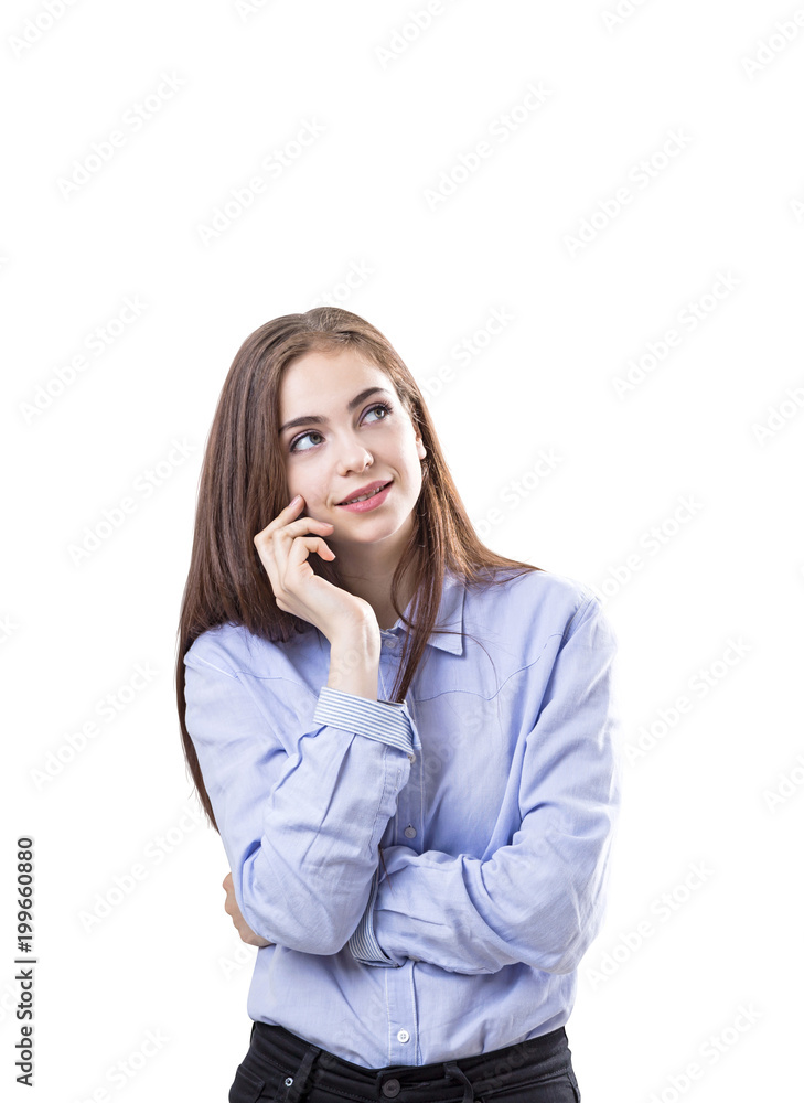Dreamy young woman in a blue shirt Dreamy young woman in a blue shirt