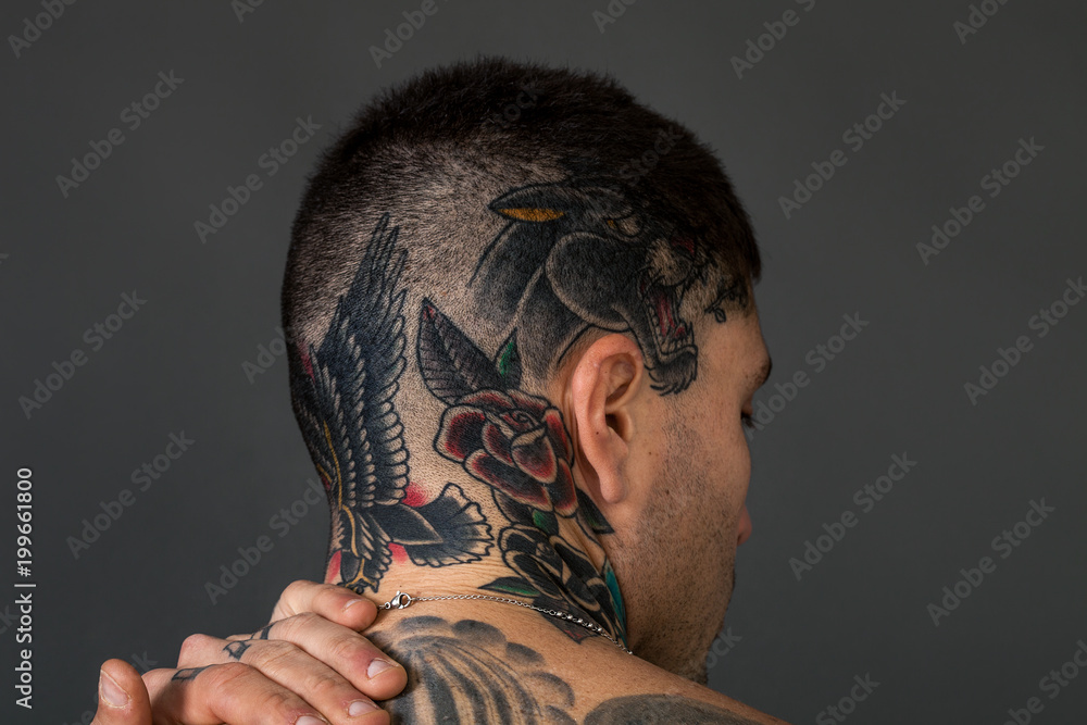 Handsome Man Back Closeup Portrait With Tattoos On His Head And Neck Stock Photo Adobe Stock Handsome Man Back Closeup Portrait With Tattoos On His Head And Neck Stock Photo Adobe Stock