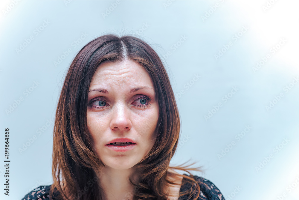 Naklejka premium beautiful girl in different clothes shows different emotions on different backgrounds
