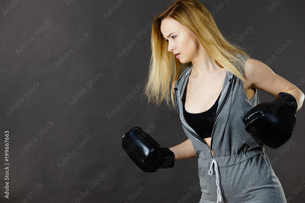 Boxer girl exercise with boxing gloves. Boxer girl exercise with boxing gloves.