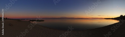 panorama of the sunset on the lake