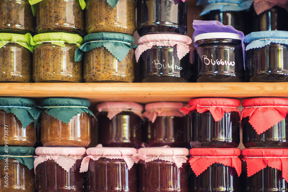 Greek homemade jam and canned food on the shelves of local shops Greek homemade jam and canned food on the shelves of local shops