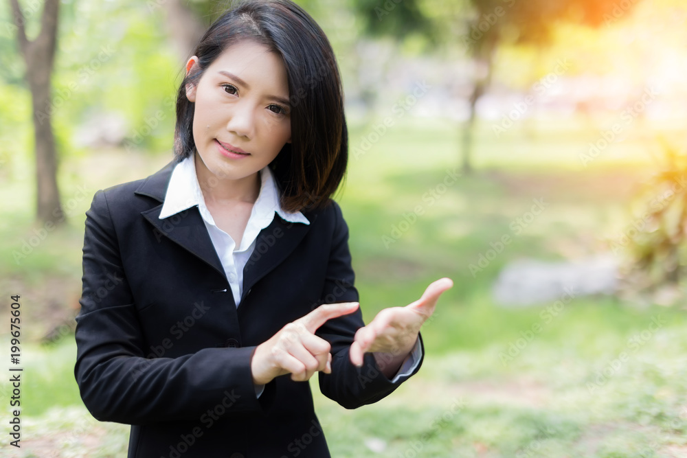 business working ideas concept with smart asiam woman in suit pretend to use laptop in garden business working ideas concept with smart asiam woman in suit pretend to use laptop in garden