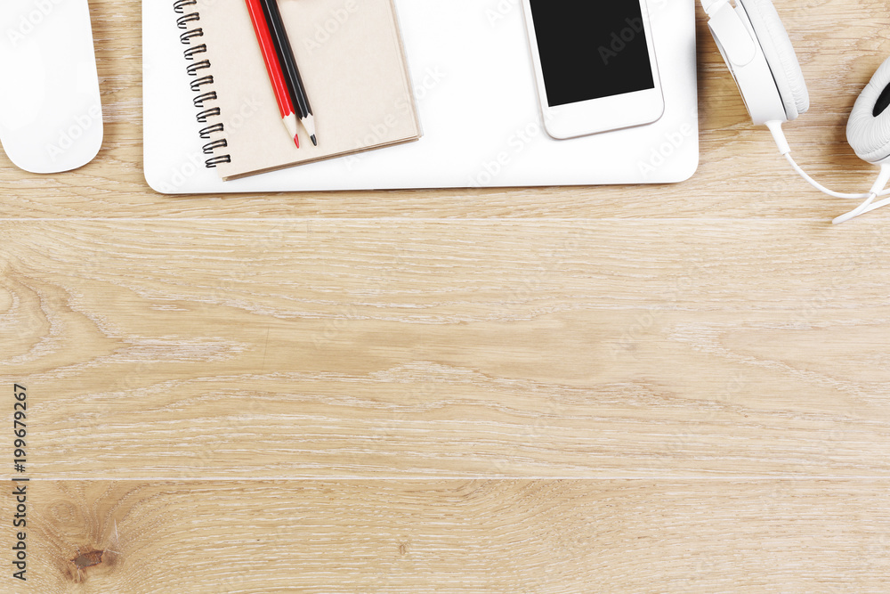 Light wooden workplace with items Light wooden workplace with items