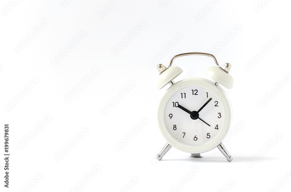 Classic bell alarm clock on white background with copy space Classic bell alarm clock on white background with copy space