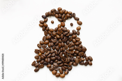 Roasted coffee beans. Isolated on white. Abstract background.