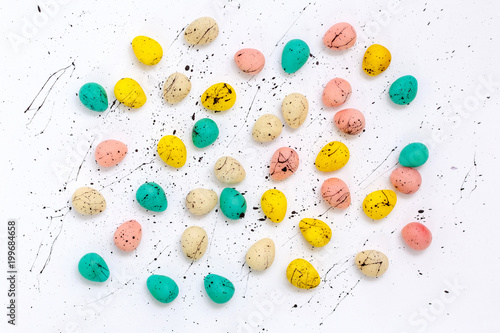 Tiny chocolate glazed colorful easter eggs