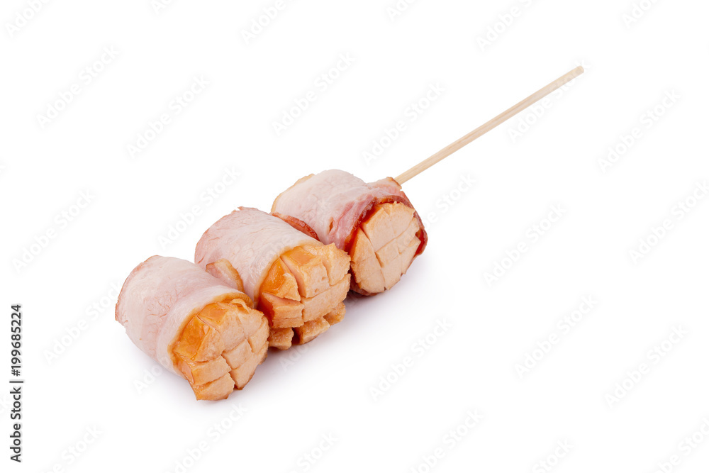 Small sausages wrapped in a blanket of smoked streaky bacon isolated on white background Small sausages wrapped in a blanket of smoked streaky bacon isolated on white background