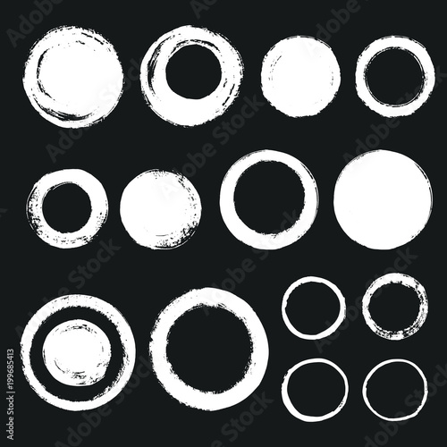 Collection of various chalk or brush drawn circles. Set of graphic elements. Round hand drawn different frames or brush strokes with rough, uneven edges.