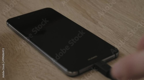 Putting smartphone to charging