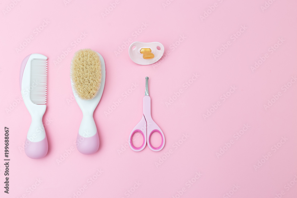 Set of pink baby accessories on pink background. Copy space Set of pink baby accessories on pink background. Copy space