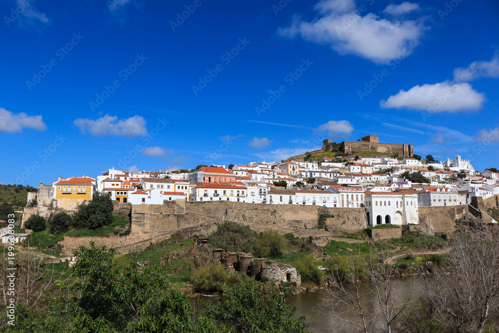 Panoramic view of Guadiana river with the ancient village of Mertola in background. Mertola Portugal