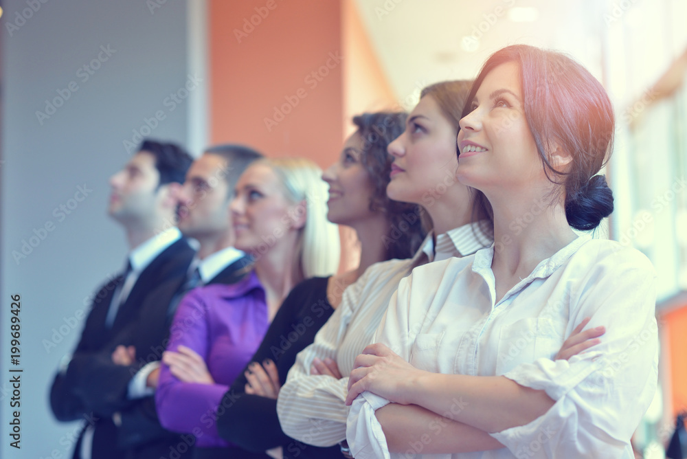 Successful group of business people at the office Successful group of business people at the office