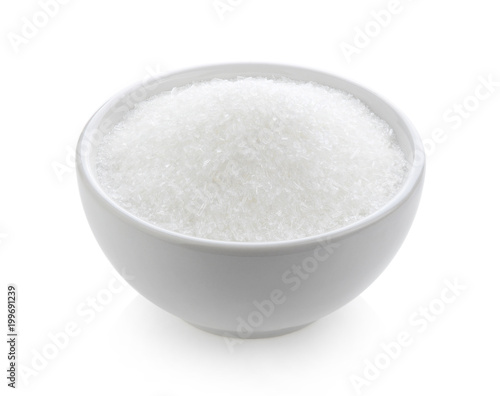 monosodium glutamate in bowl on white background