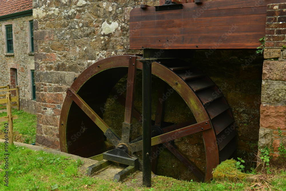 Obraz premium Watermill, Jersey, U.K. 19th century old building.