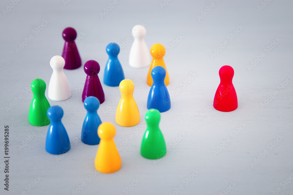 image of colorful game figures over wooden table ,human resources and management concept. image of colorful game figures over wooden table ,human resources and management concept.