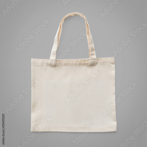Tote bag mock up canvas white cotton fabric cloth eco shopping sack mockup blank template isolated on grey background (clipping path)