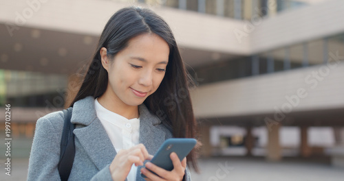 Photography Young Business woman use of mobile phone at outdoor
