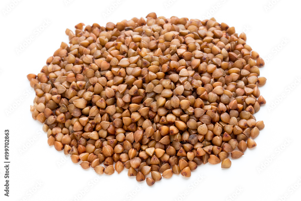 Buckwheat grains isolated on the white background. Buckwheat grains isolated on the white background.