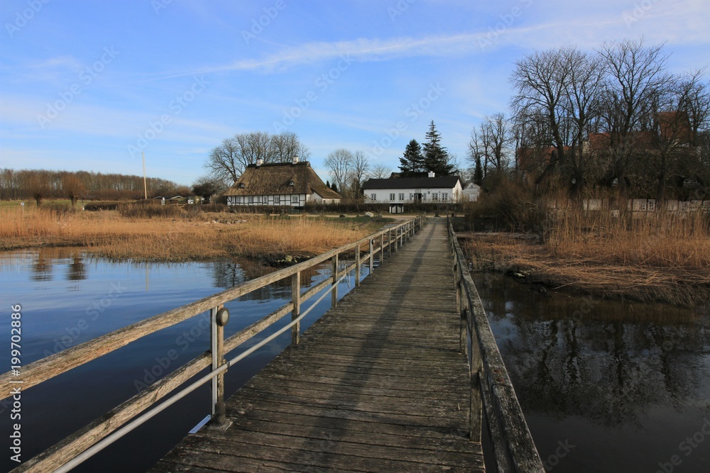 view to the pier of the historic village of Sieseby