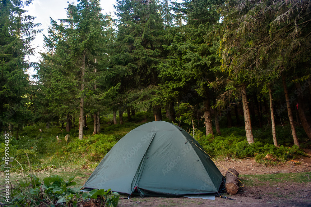 Тourist tent camping in mountains. Ukrainian Carpathians.