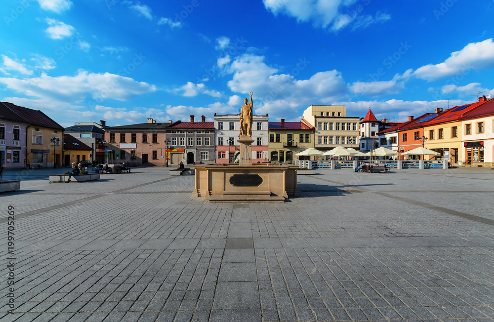 The monument Central square in Zywiec in sunny day