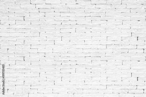Brick wall background painted texture in stained old aged stucco light white cream gray color
