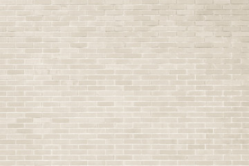 Brick wall texture pattern background in natural light cream beige brown color