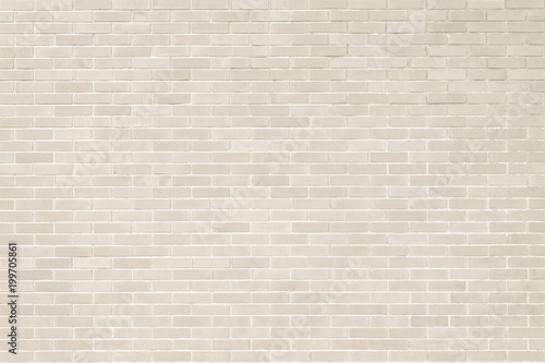 Brick wall texture pattern background in natural light cream beige brown color