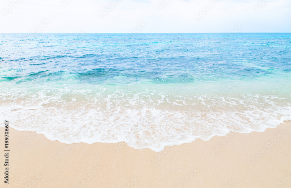 Beautiful wave touch sand beach of Miyako island, Okinawa, Japan Beautiful wave touch sand beach of Miyako island, Okinawa, Japan
