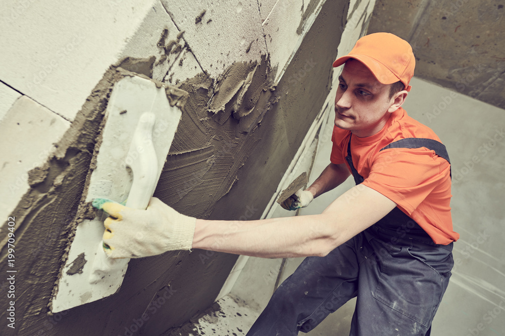 Plasterer putting plaster on wall. slow motion Plasterer putting plaster on wall. slow motion