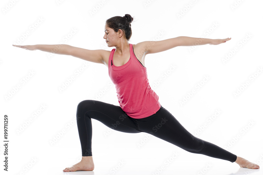 young woman performing yoga, india young woman performing yoga, india