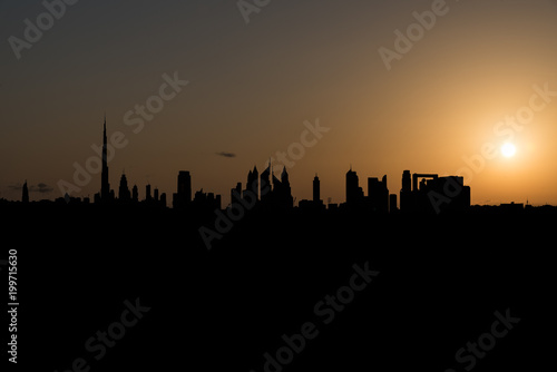 Dubai skyline with different architectural designs seen at sunset