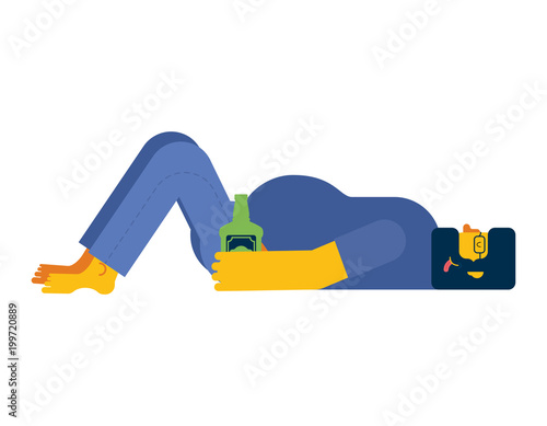Drunk man lies on floor. father and bottle of alcohol.