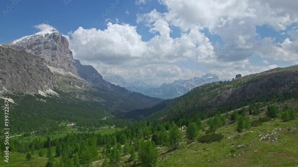 AERIAL VIEW: flight over Passo Falzarego. Italian Dolomites alps.camera moves farwards AERIAL VIEW: flight over Passo Falzarego. Italian Dolomites alps.camera moves farwards