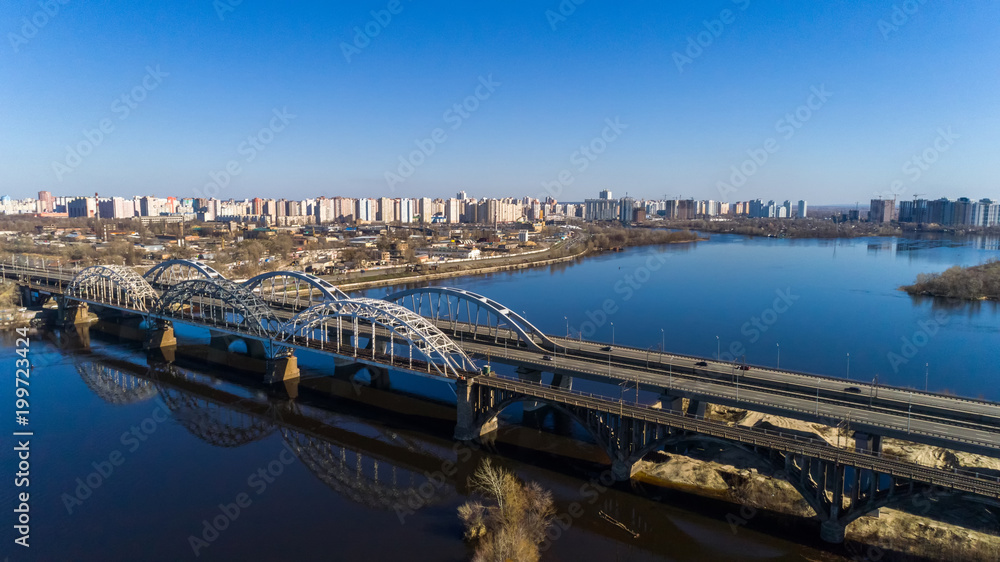 Aerial view of the Kiev city, Ukraine. Dnieper river with bridges. Darnitskiy bridge