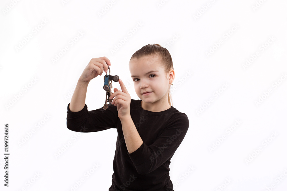 cheerful little girl holding the keys cheerful little girl holding the keys
