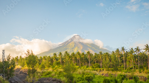 Mayon Volcano in Legazpi, Philippines. Mayon Volcano is an active volcano and rising 2462 meters from the shores of the Gulf of Albay. photo