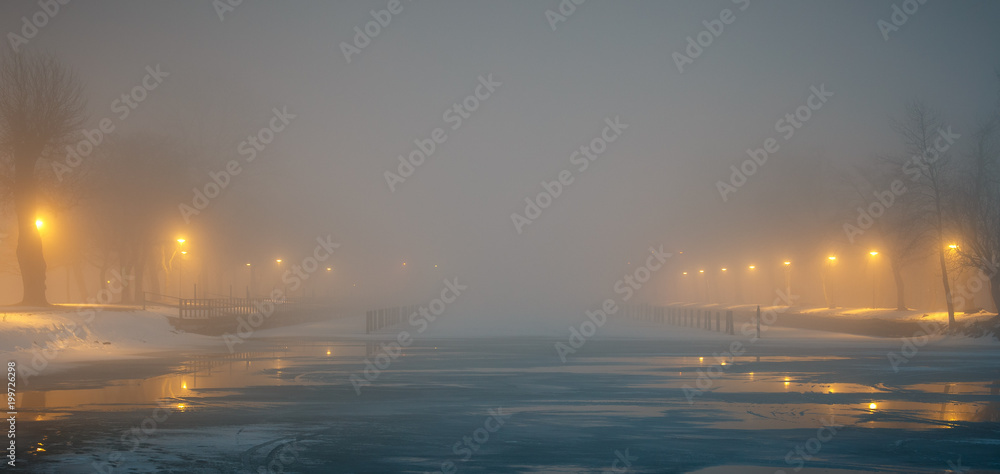 Winter image of a seafront with lights that shine Winter image of a seafront with lights that shine