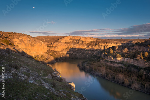 Hoces del Duraton canyon natural park during golden hour in Segovia, Spain.