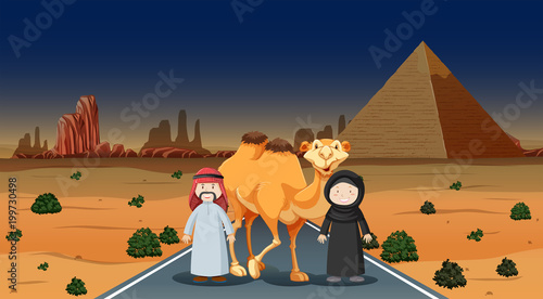 Two people and camel in the desert