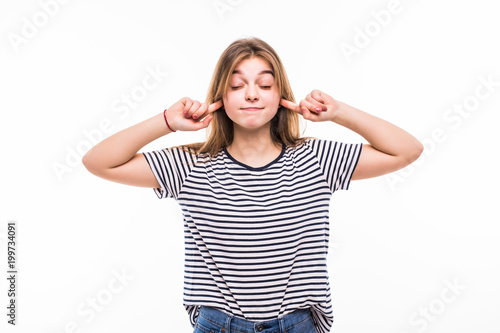 Εκτύπωση καμβά portrait of attractive teenage girl with hands on ears, isolated over white back