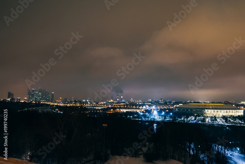 MOSCOW, RUSSIA - DECEMBER 25, 2016: A view of the Luzhniki stadium from Sparrow hills in Moscow at night