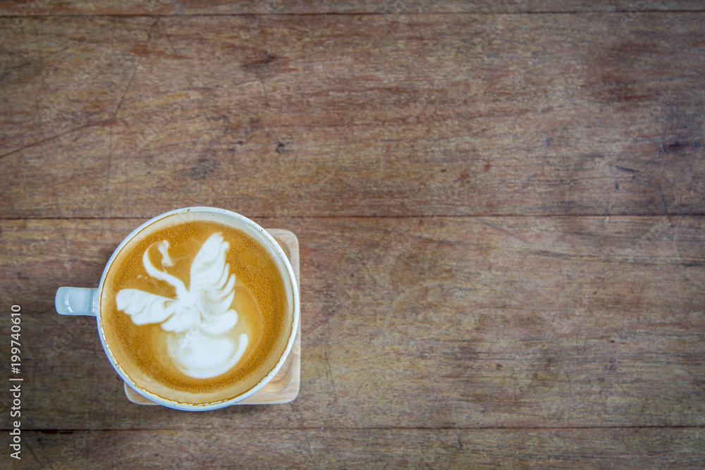 latte art coffe on wood table latte art coffe on wood table