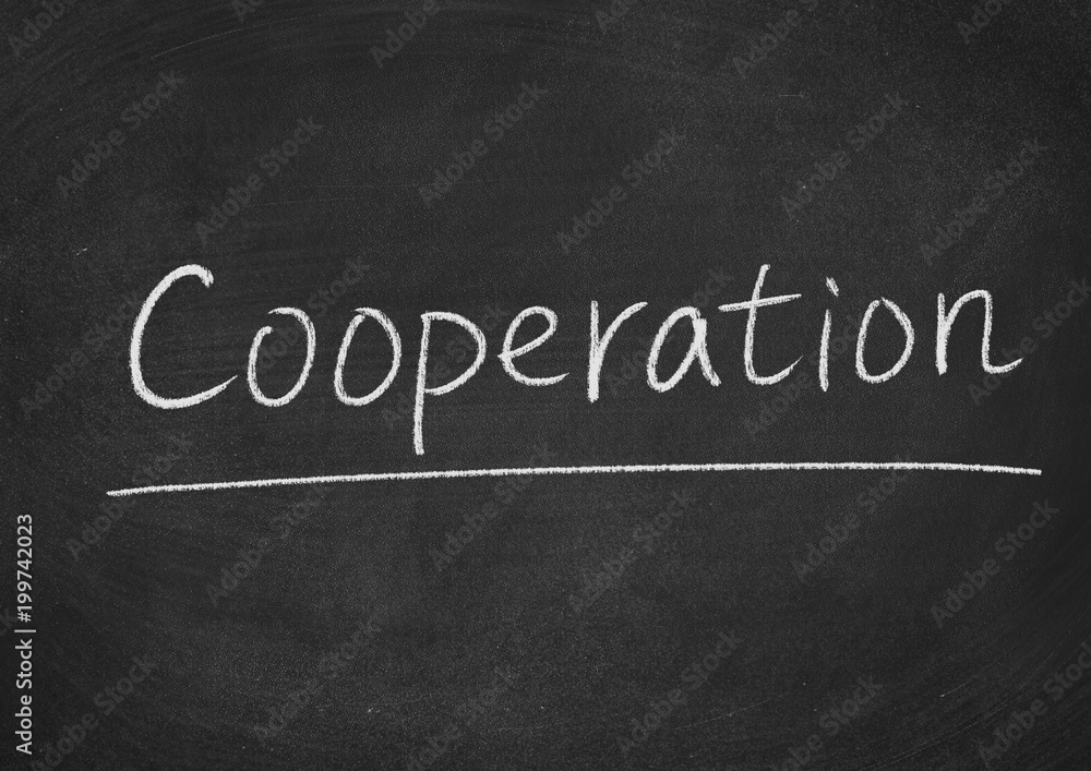 Obraz premium cooperation concept word on a blackboard background