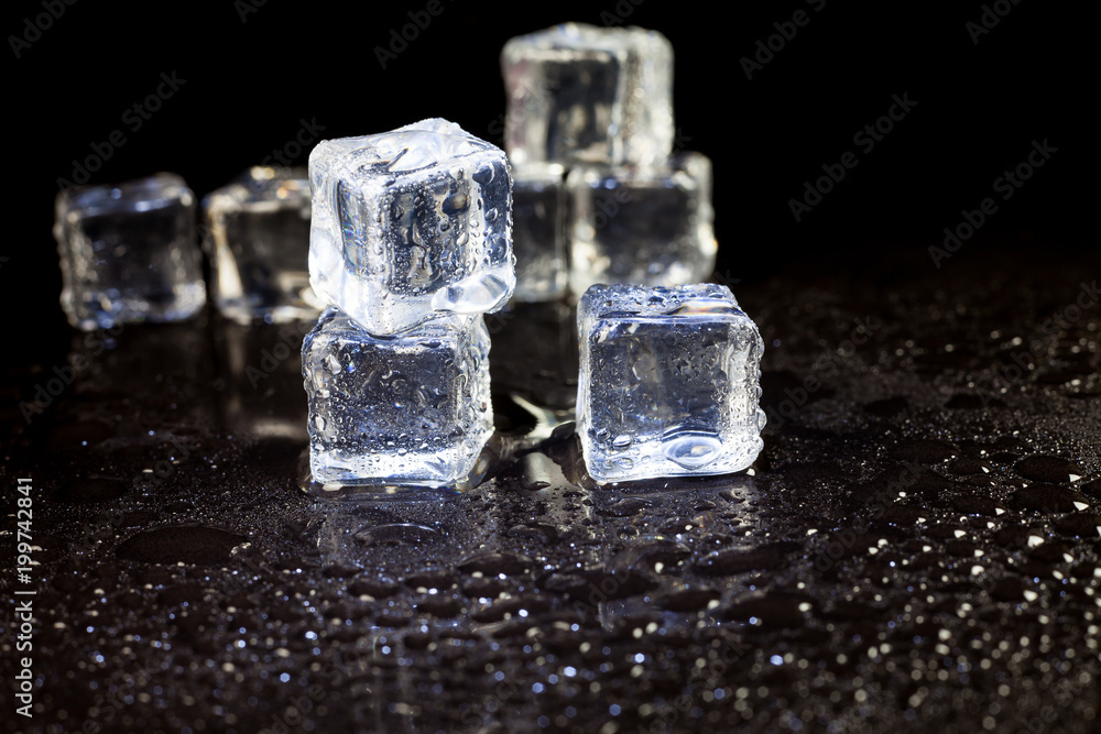 ice cubes on black background. ice cubes on black background.